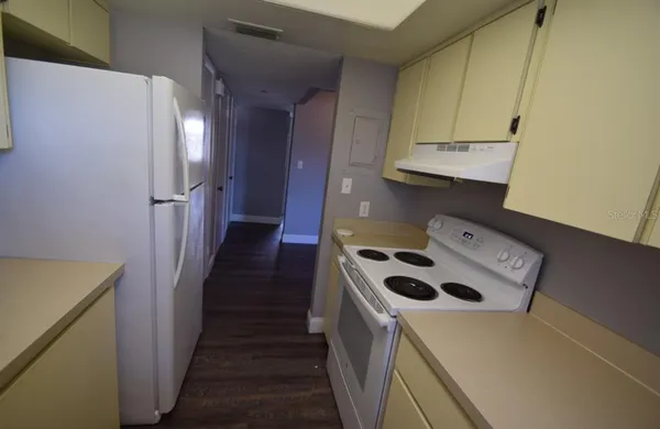 a view of storage and utility room with washer and dryer