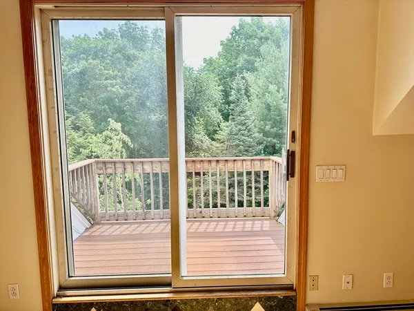 a view of a room that has a windows