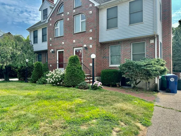 a house view with a garden space