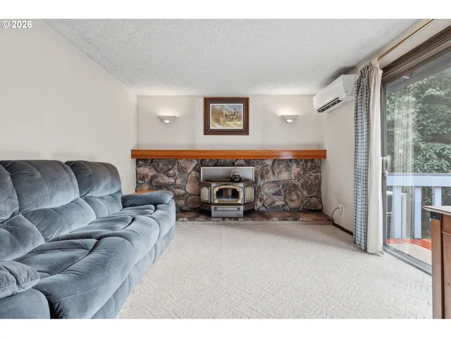 a bedroom with bed and window