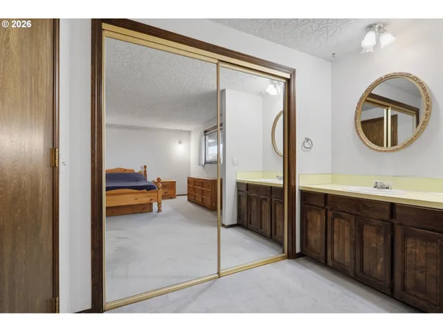 a bathroom with a toilet and a sink