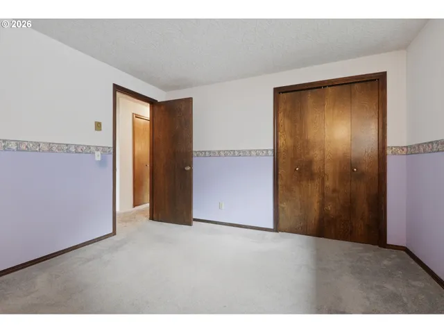 a bathroom with a sink a vanity and a toilet