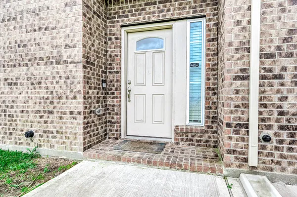 a front view of a house with a door