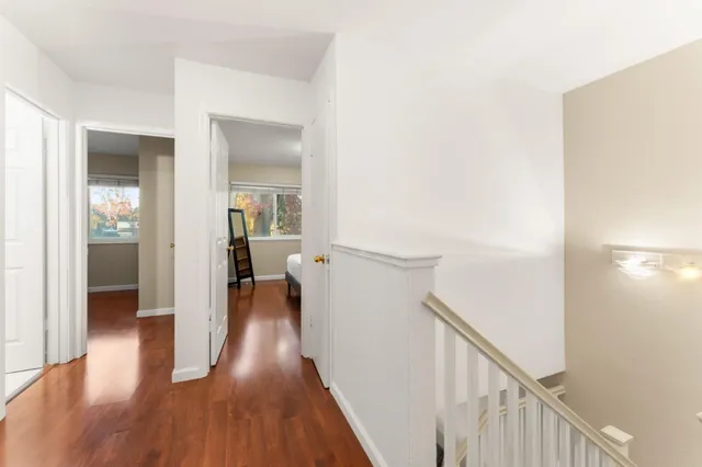 a large white bed in a white room