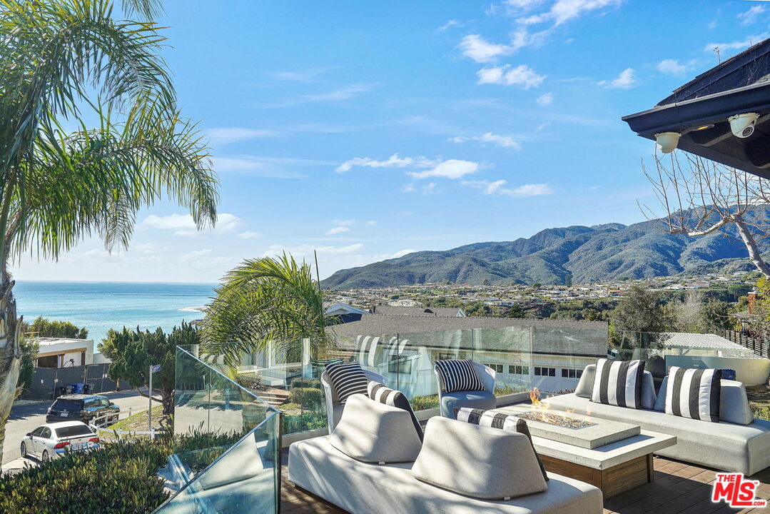 204 Tranquillo Road Pacific Palisades, CA 90272 - Photo 1 of 34 a view of balcony with furniture and a garden