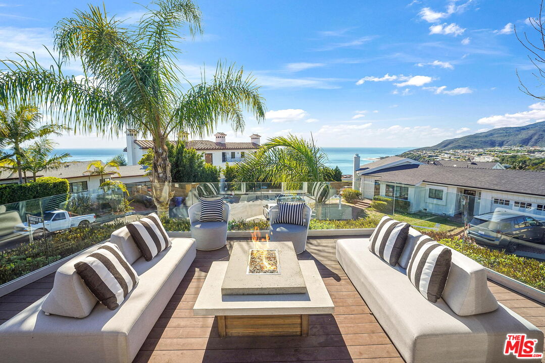 204 Tranquillo Road Pacific Palisades, CA 90272 - Photo 2 of 34 a view of swimming pool with outdoor seating