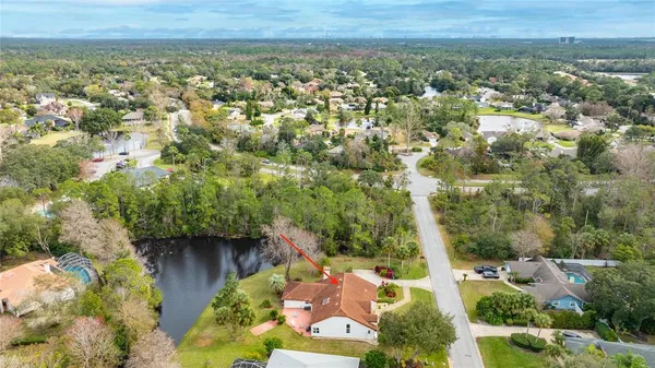 an aerial view of residential house with outdoor space