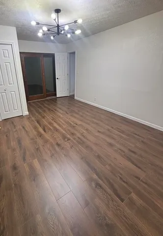 a view of entryway with wooden floor