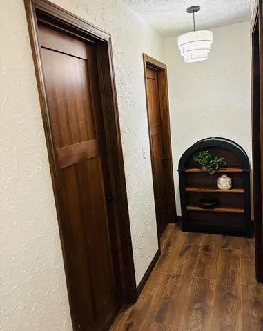 a white toilet sitting next to a shower curtain