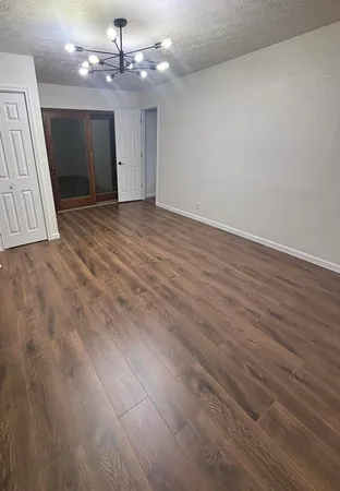 a view of entryway with wooden floor
