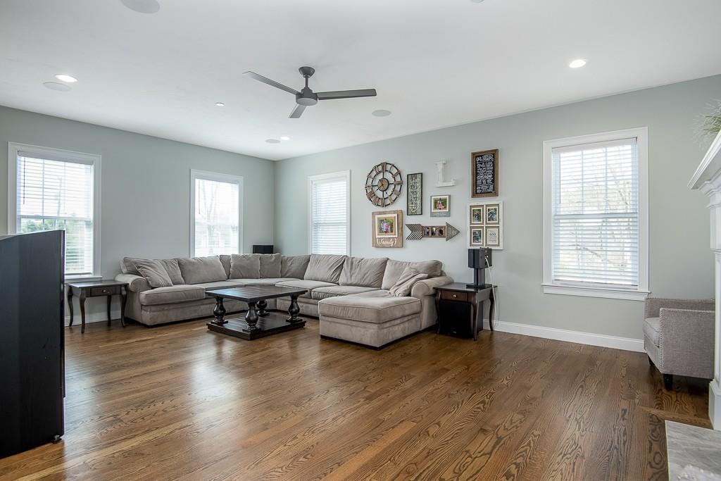 222 Sugar Road Bolton, MA 01740 - Photo 12 of 36 a living room with furniture and wooden floor