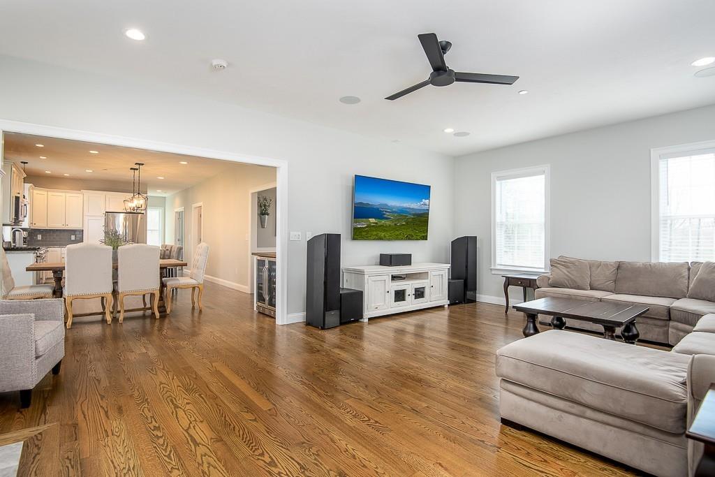 222 Sugar Road Bolton, MA 01740 - Photo 13 of 36 a living room with furniture and kitchen view