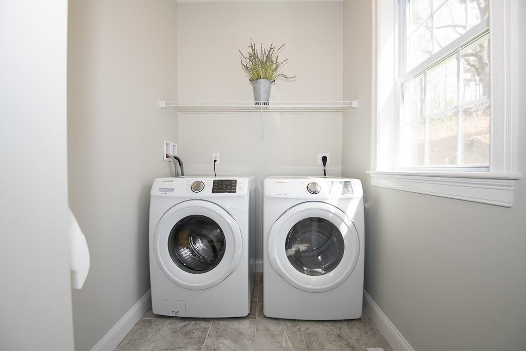 222 Sugar Road Bolton, MA 01740 - Photo 17 of 36 a utility room with a washer and dryer
