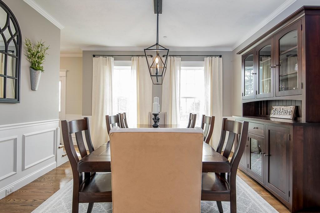 222 Sugar Road Bolton, MA 01740 - Photo 9 of 36 a view of a dining room with furniture window and outside view