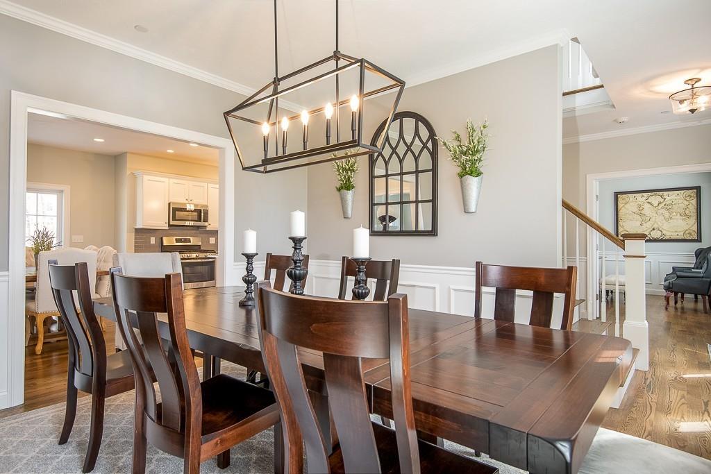 222 Sugar Road Bolton, MA 01740 - Photo 10 of 36 a dining room with furniture and window