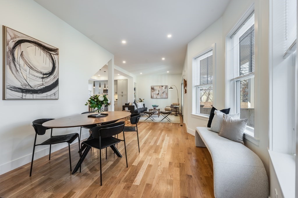 96 Otis Street, Unit 2 Cambridge, MA 02141 - Photo 18 of 42 a living room with furniture and a clock