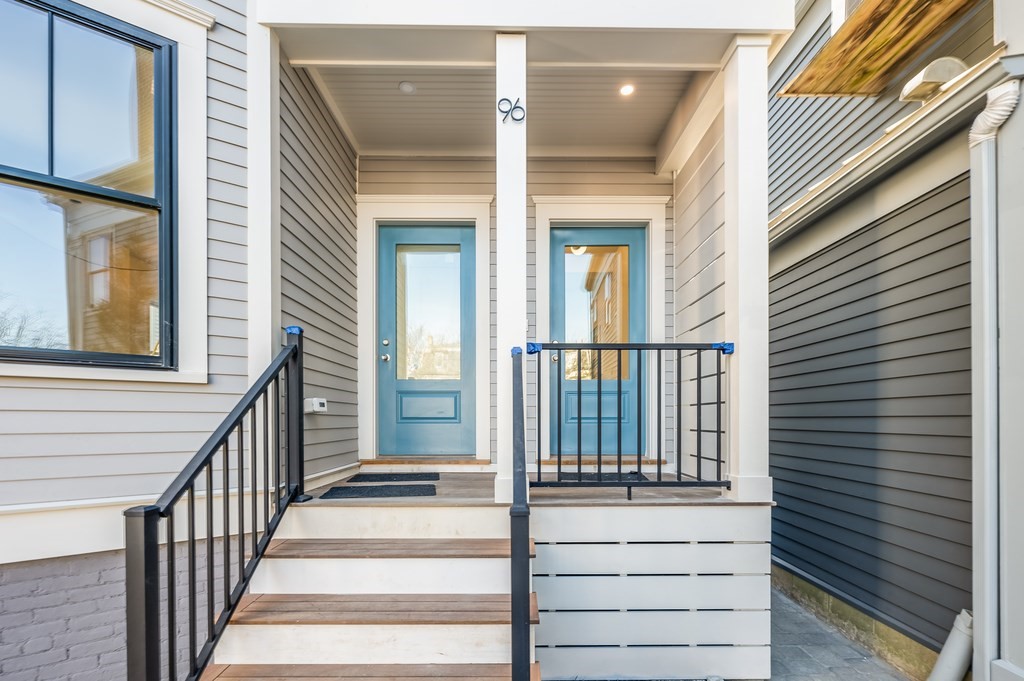 96 Otis Street, Unit 2 Cambridge, MA 02141 - Photo 2 of 42 a view of a balcony with wooden floor and fence