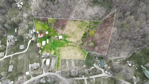$250,000 | 427 Cove Creek Road, Roan Mountain, TN 37687