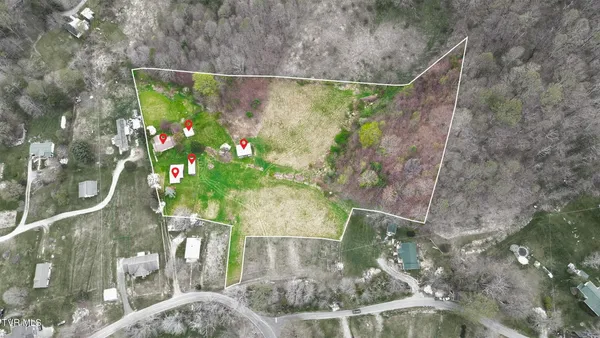 $250,000 | 427 Cove Creek Road, Roan Mountain, TN 37687