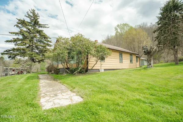 $250,000 | 427 Cove Creek Road, Roan Mountain, TN 37687