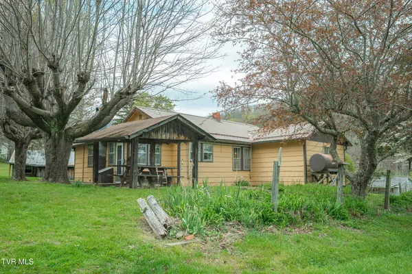 $250,000 | 427 Cove Creek Road, Roan Mountain, TN 37687