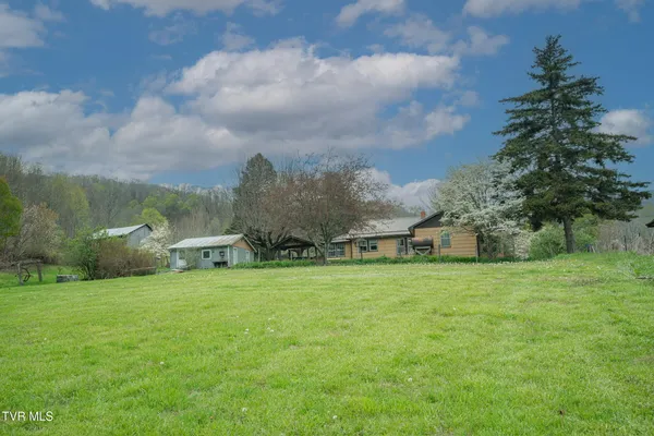 $250,000 | 427 Cove Creek Road, Roan Mountain, TN 37687