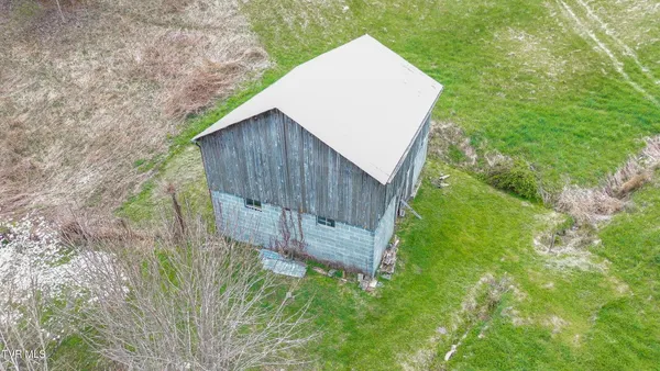 $250,000 | 427 Cove Creek Road, Roan Mountain, TN 37687