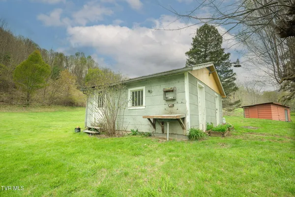$250,000 | 427 Cove Creek Road, Roan Mountain, TN 37687