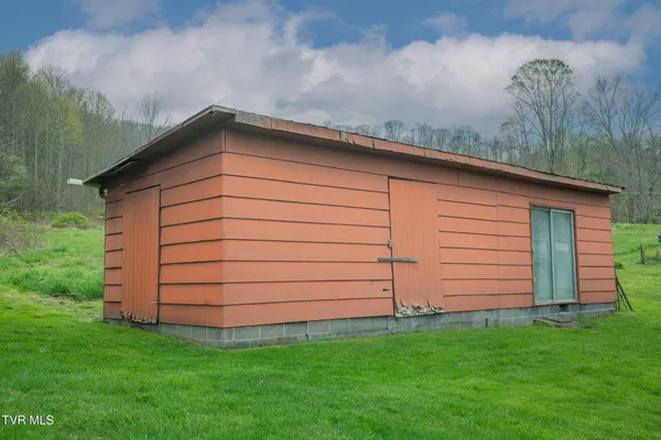 $250,000 | 427 Cove Creek Road, Roan Mountain, TN 37687