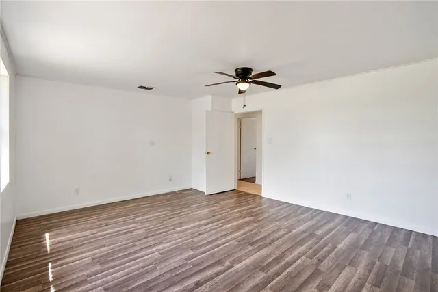 a bathroom with a granite countertop sink mirror and a