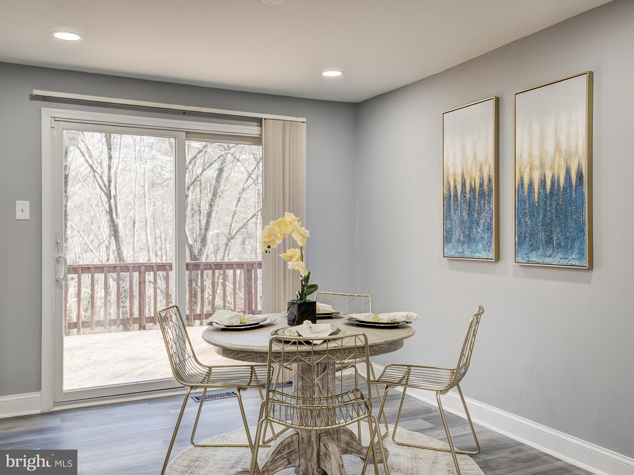 10814 Oldfield Drive Reston, VA 20191 - Photo 15 of 77 a dining room with furniture and window