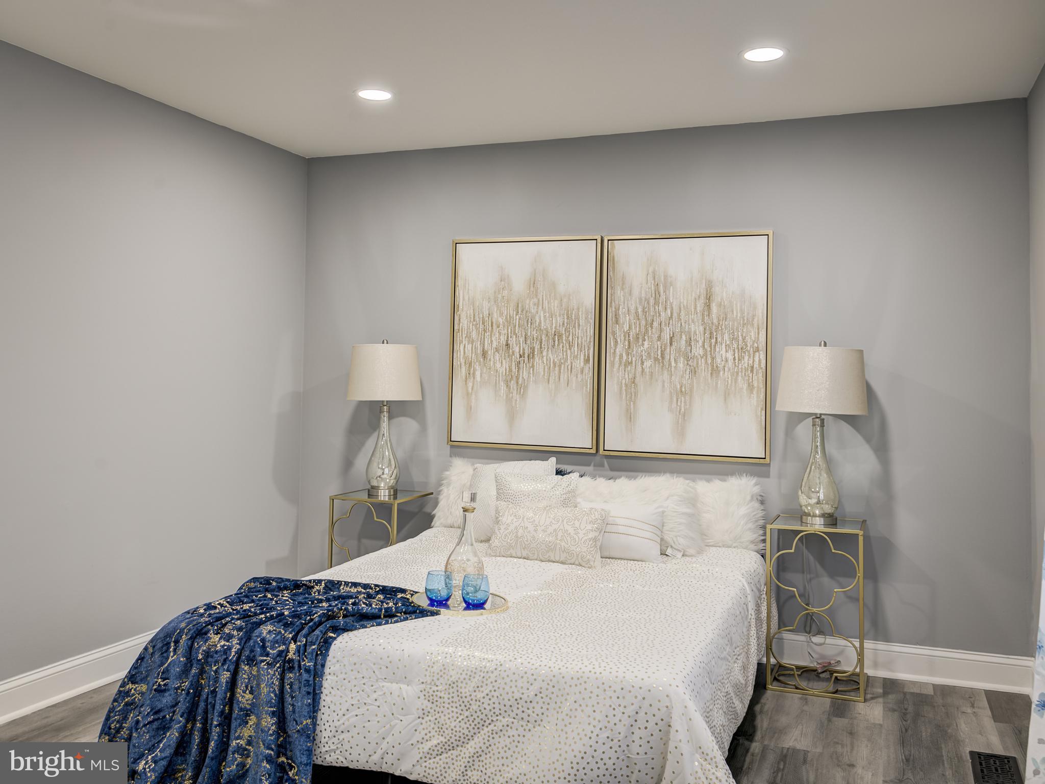 10814 Oldfield Drive Reston, VA 20191 - Photo 41 of 77 a bedroom with a bed and a window