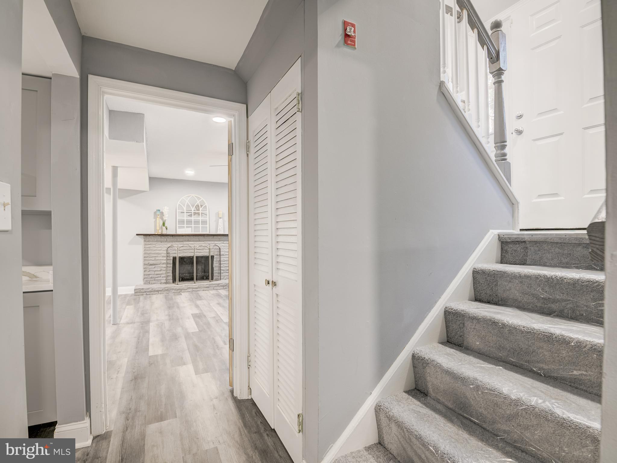 10814 Oldfield Drive Reston, VA 20191 - Photo 46 of 77 a view of entryway and hall with wooden floor
