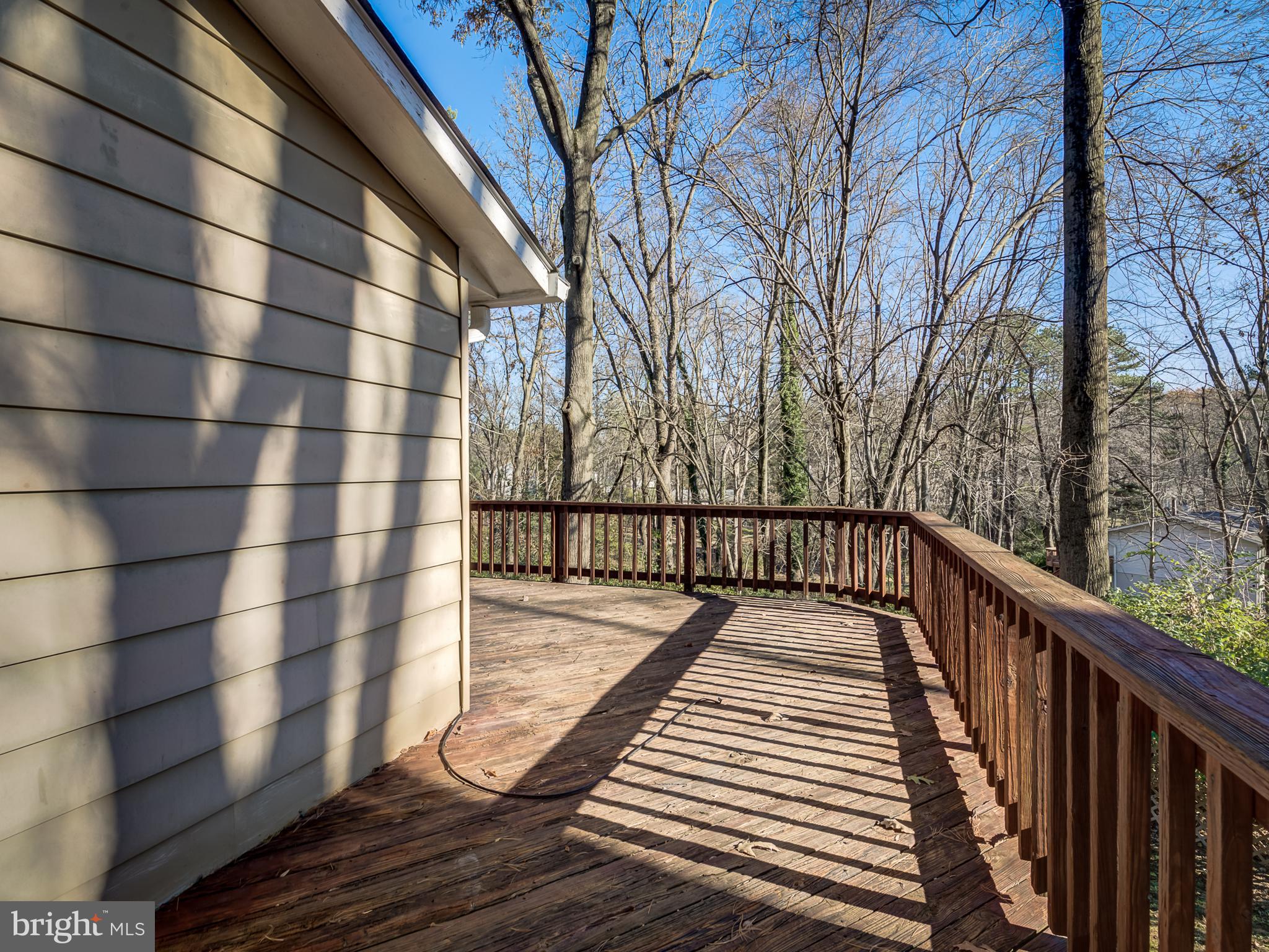 10814 Oldfield Drive Reston, VA 20191 - Photo 62 of 77 a view of balcony with wooden floor and fence