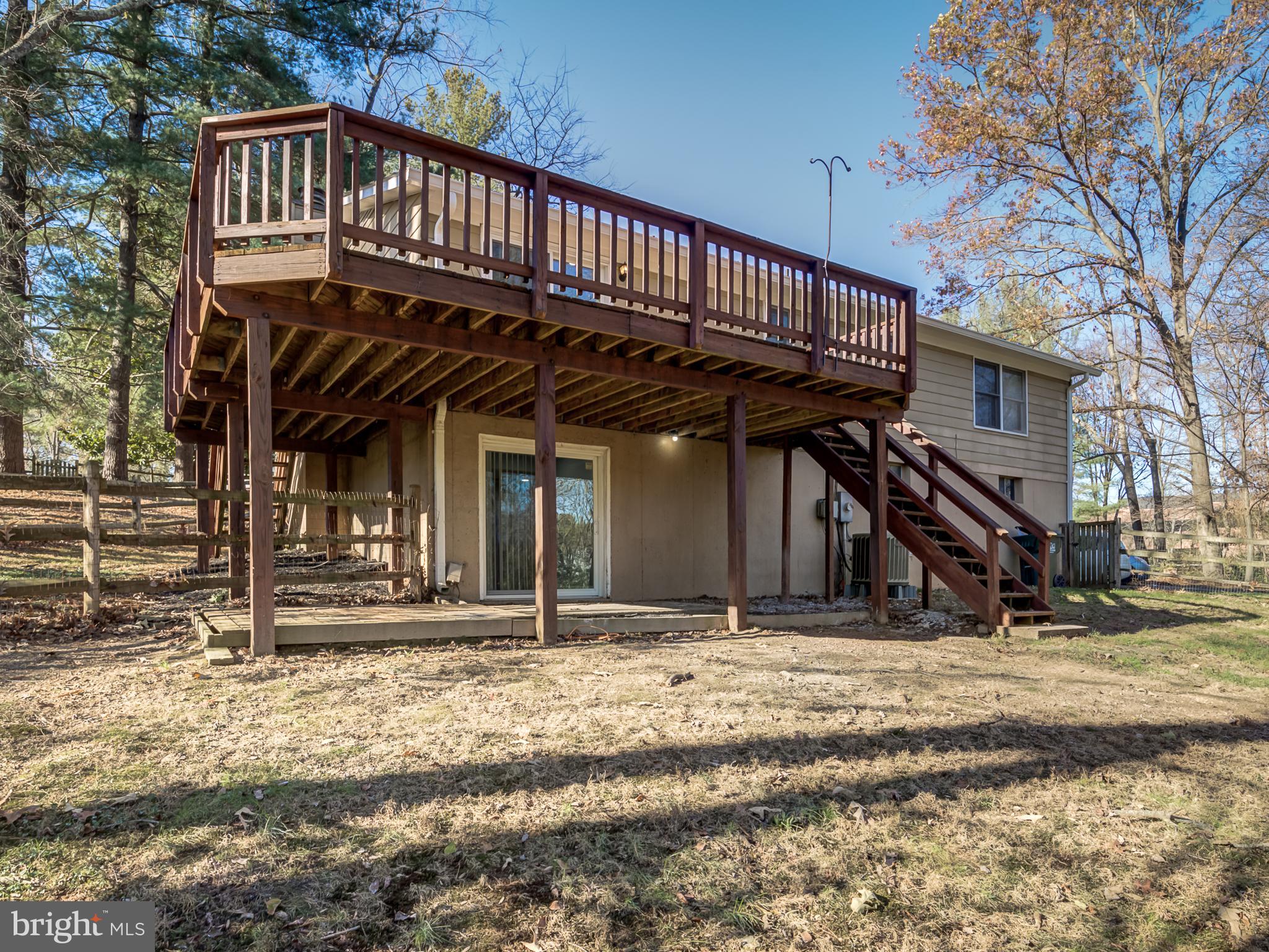 10814 Oldfield Drive Reston, VA 20191 - Photo 66 of 77 a view of a house with a backyard