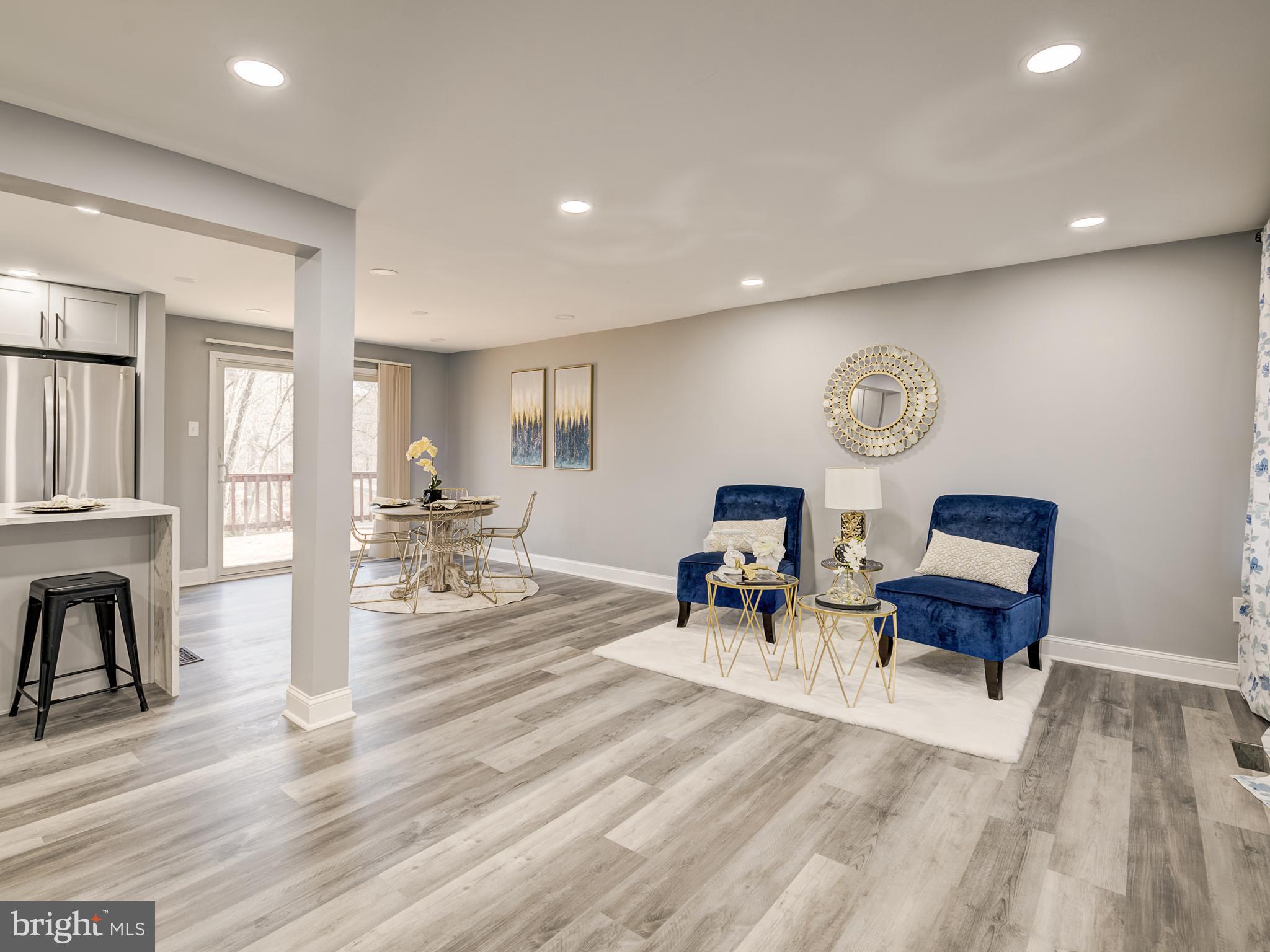 10814 Oldfield Drive Reston, VA 20191 - Photo 10 of 77 a living room with furniture and wooden floor
