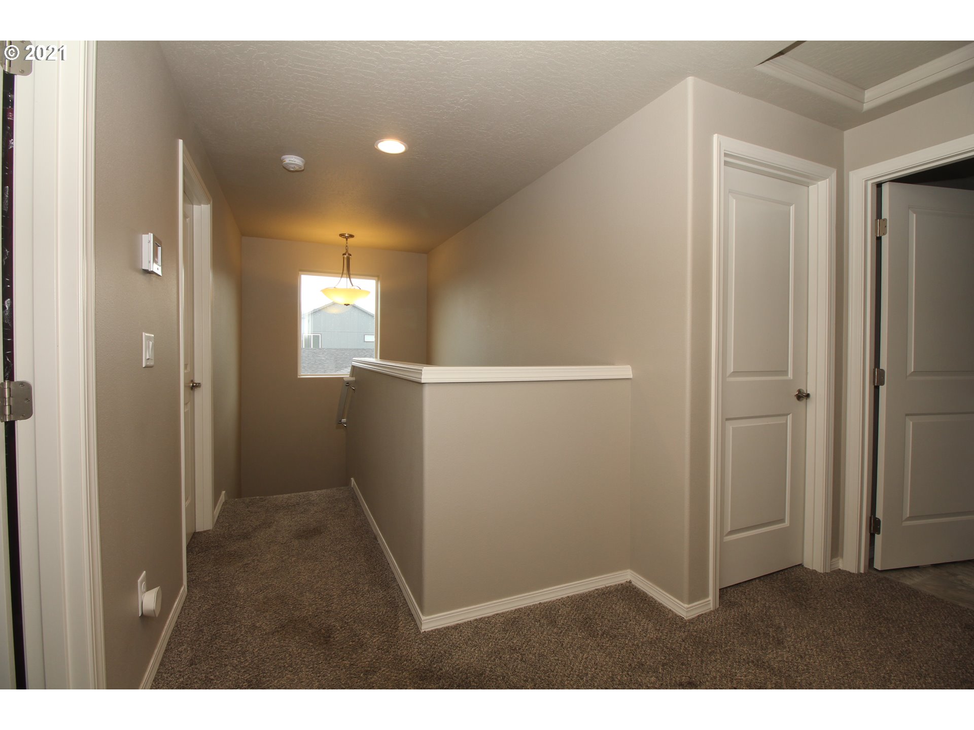 2041 South 59th Street Springfield, OR 97478 - Photo 25 of 31 a view of an empty room and closet area