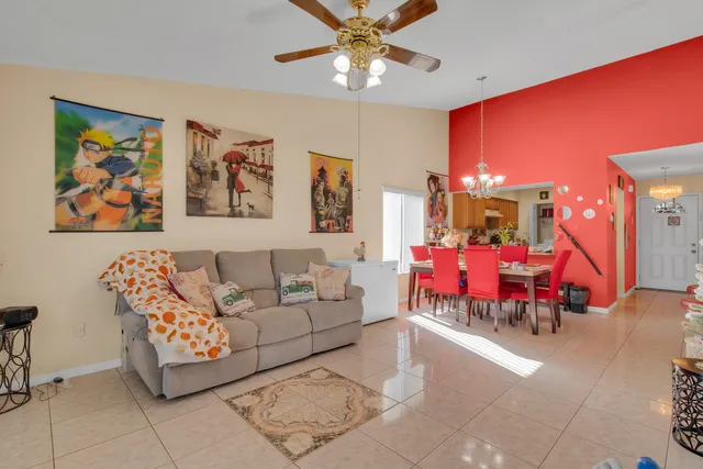 a view of a chairs and table in patio