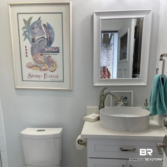 32937 River Road Orange Beach, AL 36561 - Photo 35 of 42 Bathroom featuring vanity and toilet