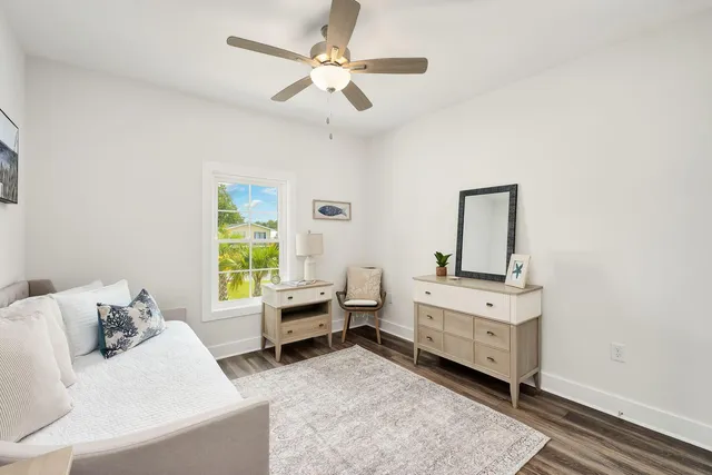 a living room with furniture and windows