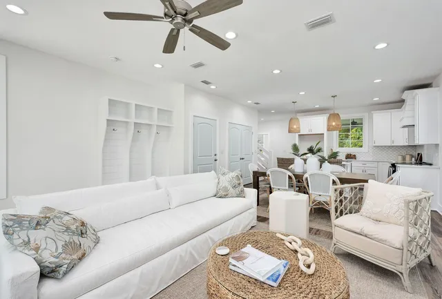 a living room with furniture and a rug