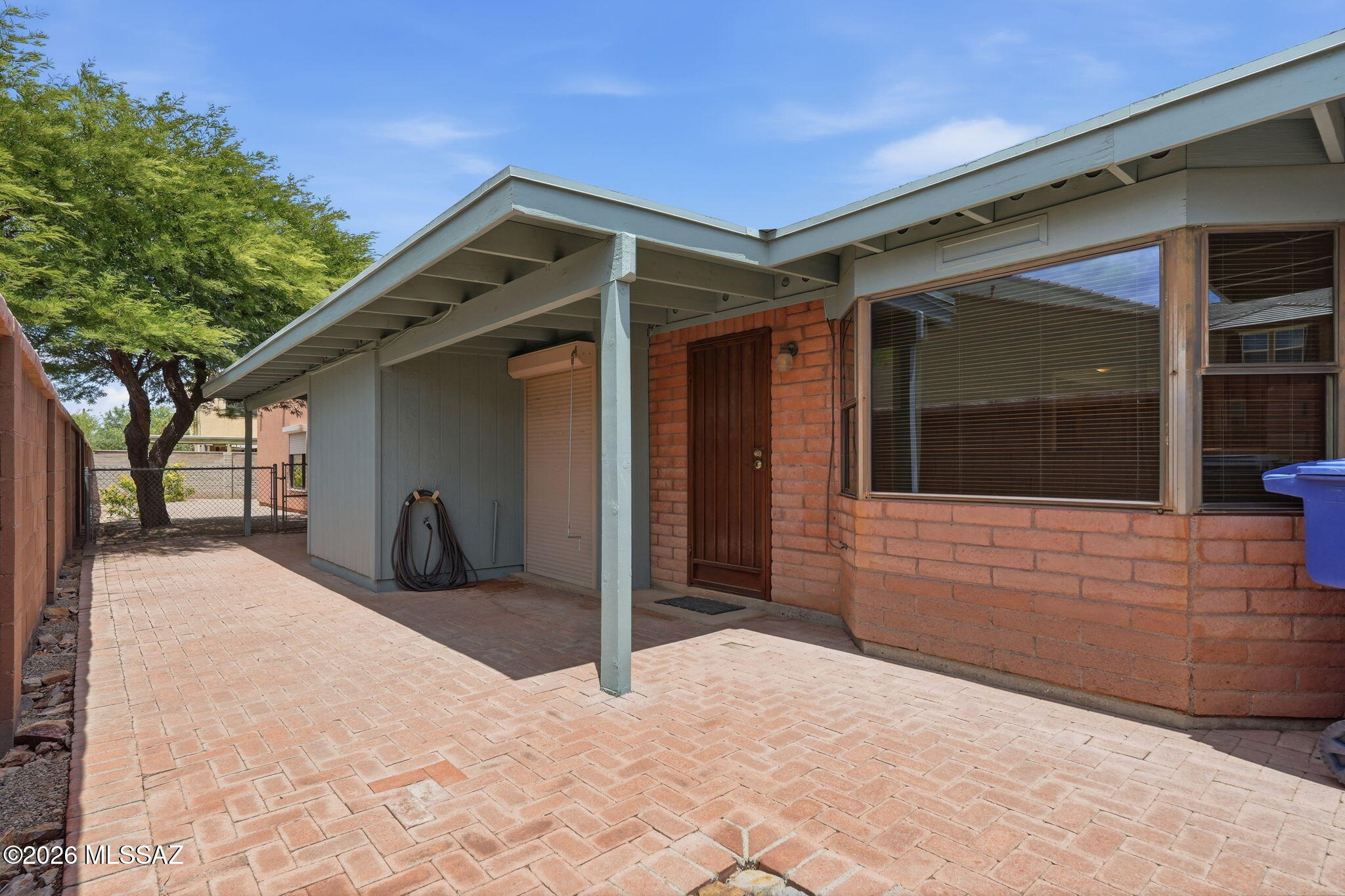 1125 East Kleindale Road Tucson, AZ 85719 - Photo 24 of 49 a view of a house with a yard