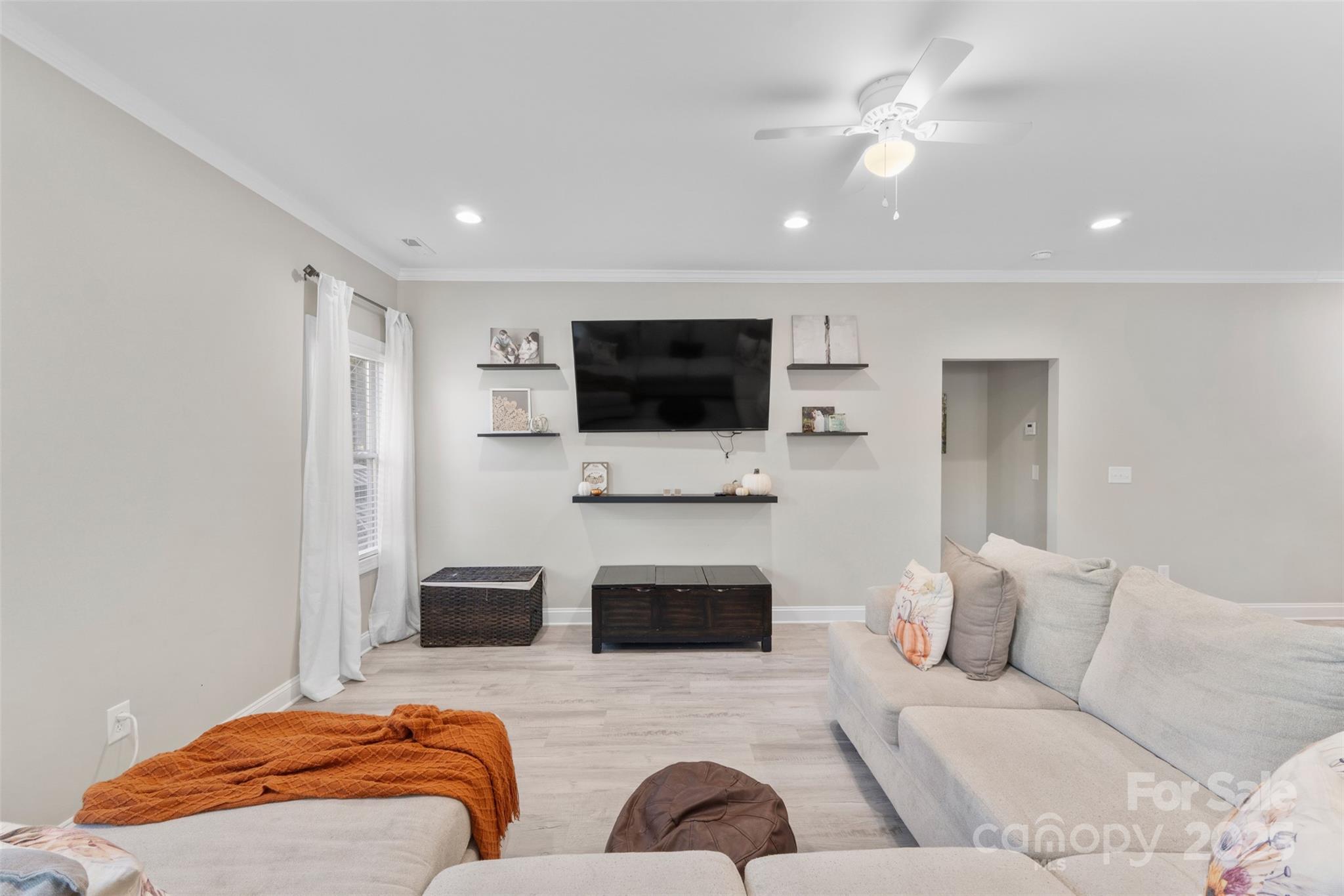 1417 Azalea Avenue Kannapolis, NC 28081 - Photo 8 of 20 a bedroom with furniture and a flat screen tv