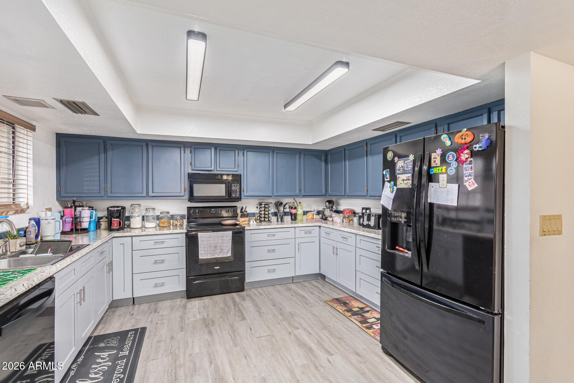 21613 South 154th Street Gilbert, AZ 85298 - Photo 14 of 57 a kitchen with cabinets and stainless steel appliances