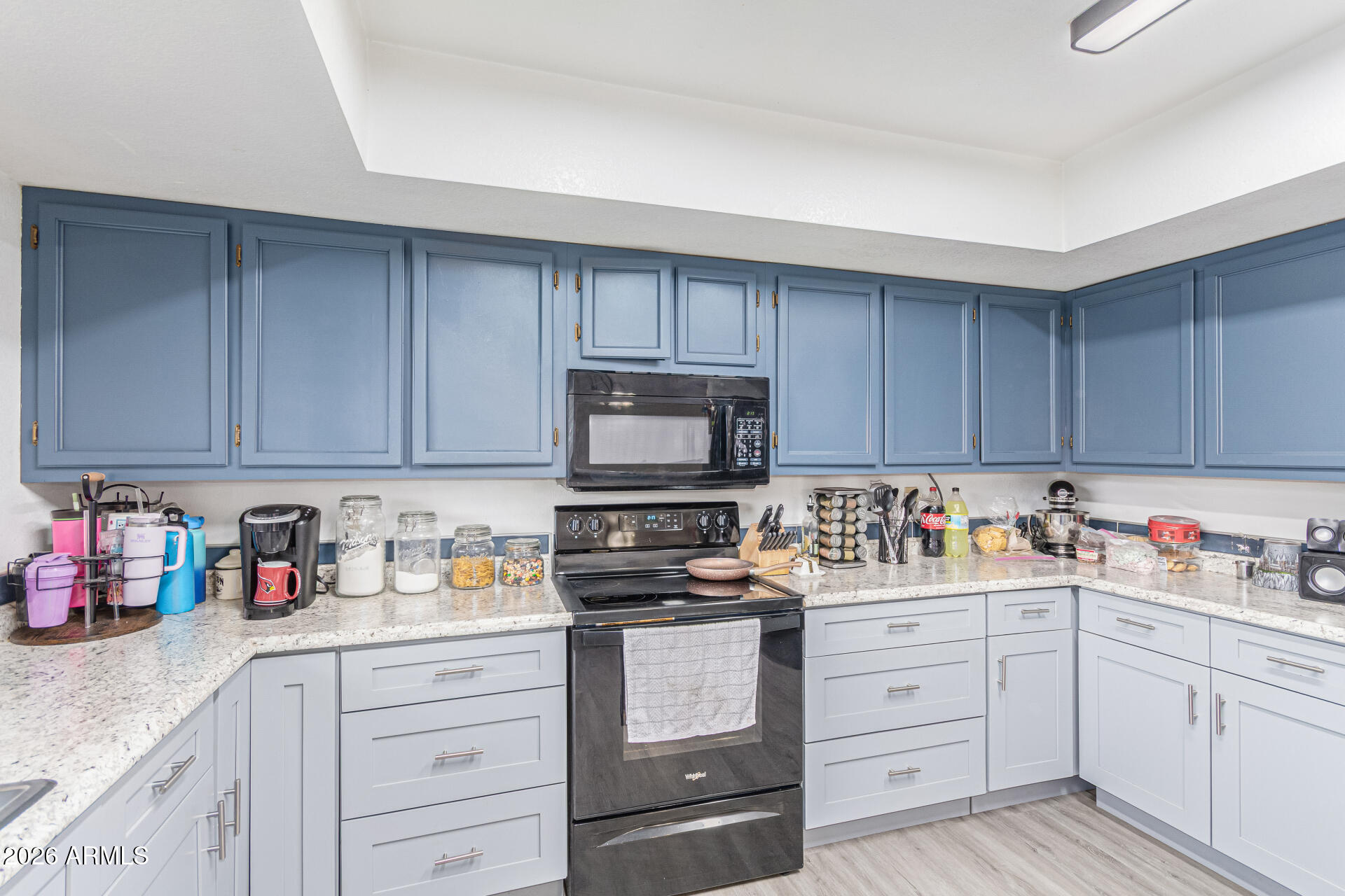 21613 South 154th Street Gilbert, AZ 85298 - Photo 15 of 57 a kitchen with cabinets stainless steel appliances and cabinets