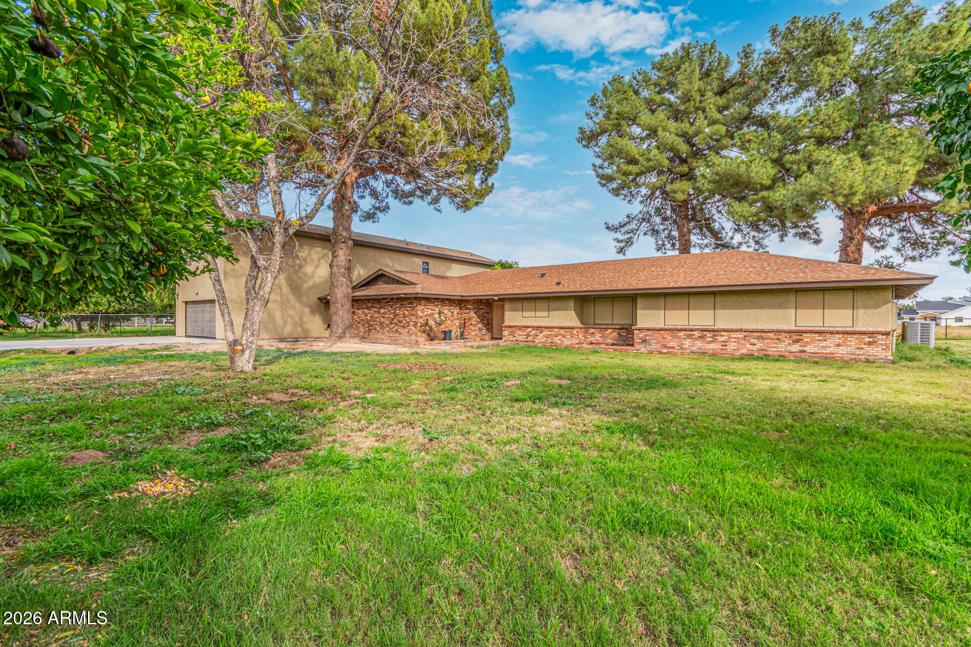 21613 South 154th Street Gilbert, AZ 85298 - Photo 2 of 57 a view of a house with a yard
