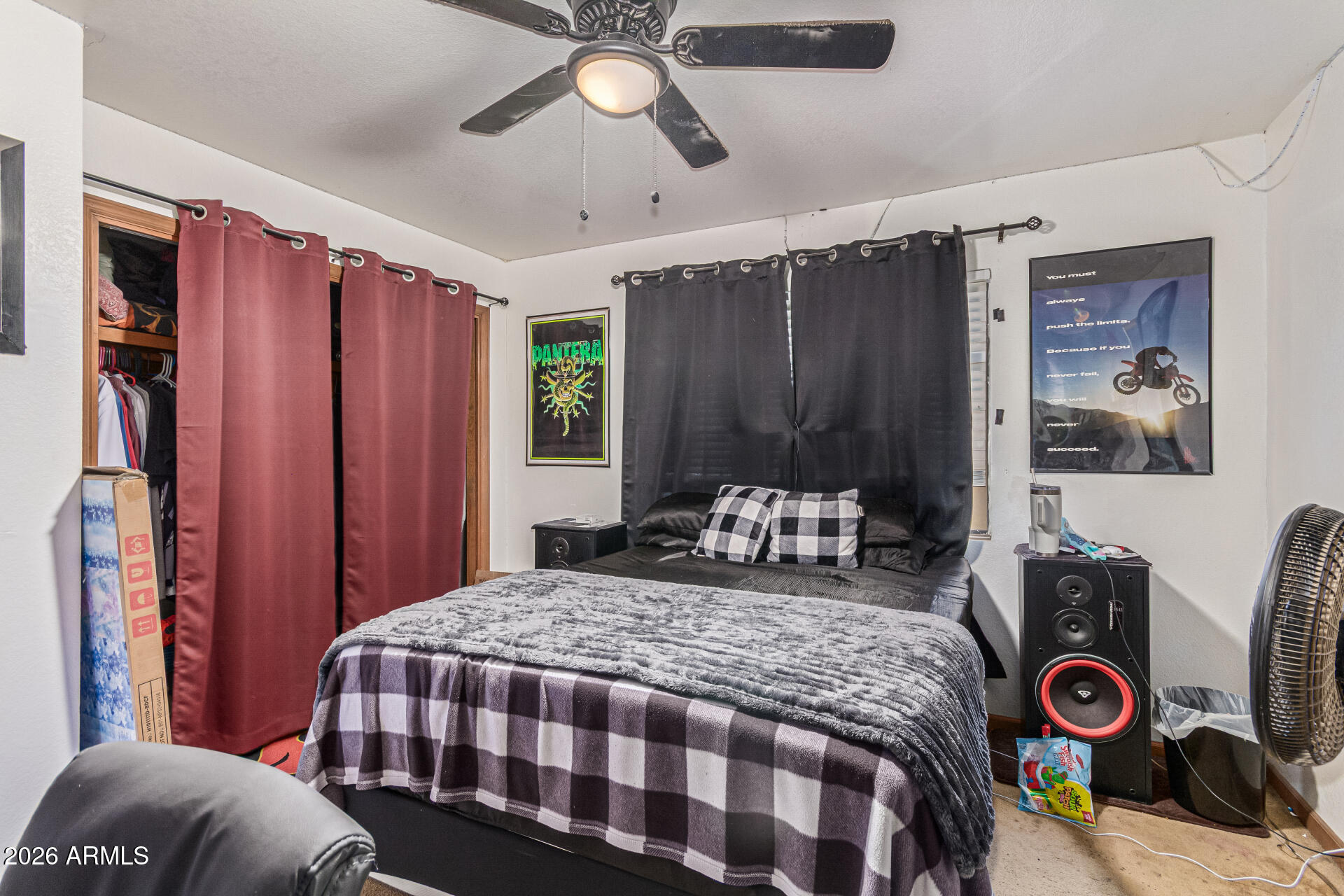 21613 South 154th Street Gilbert, AZ 85298 - Photo 27 of 57 a bedroom with a bed a dresser and a window