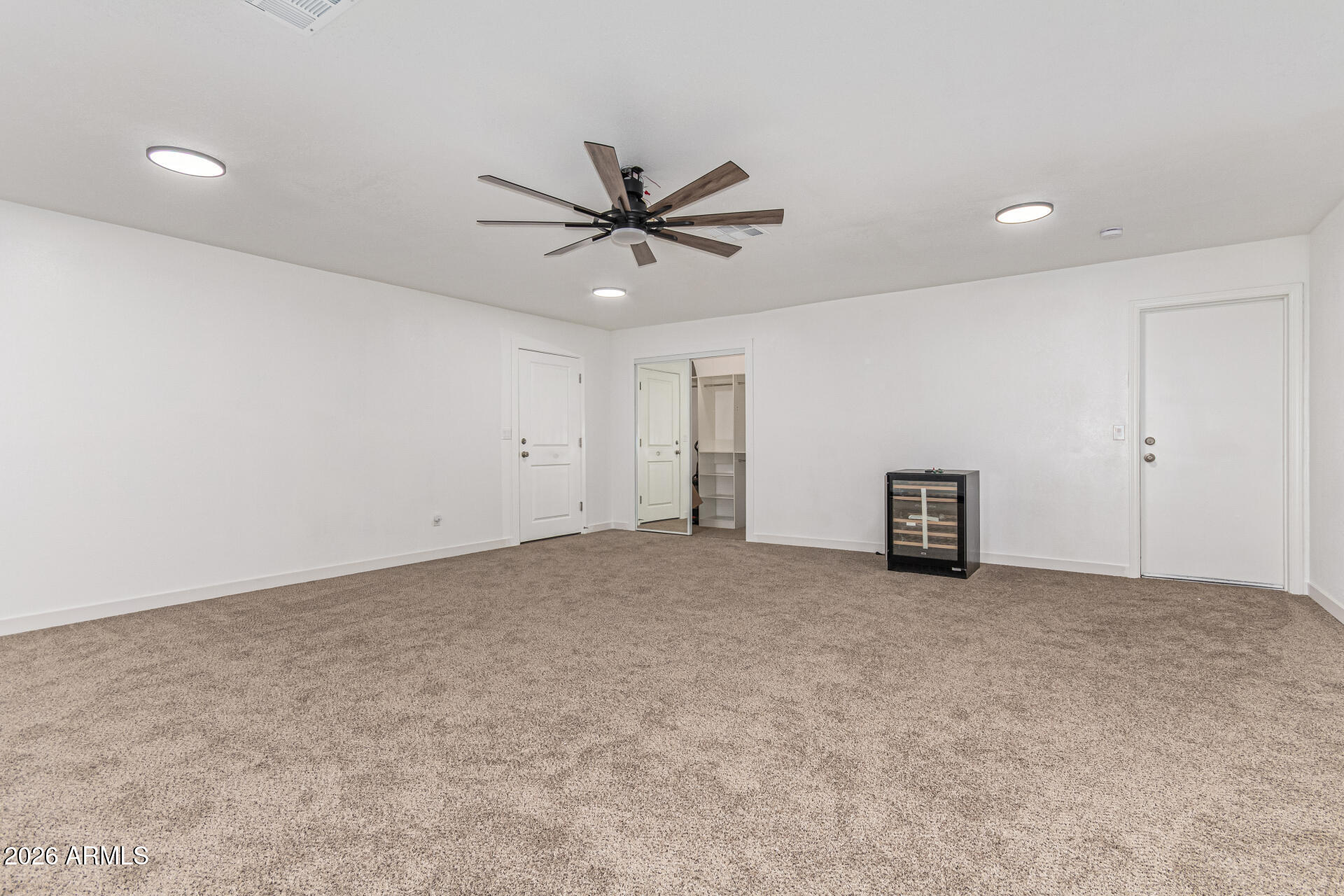 21613 South 154th Street Gilbert, AZ 85298 - Photo 47 of 57 an empty room with closet and windows