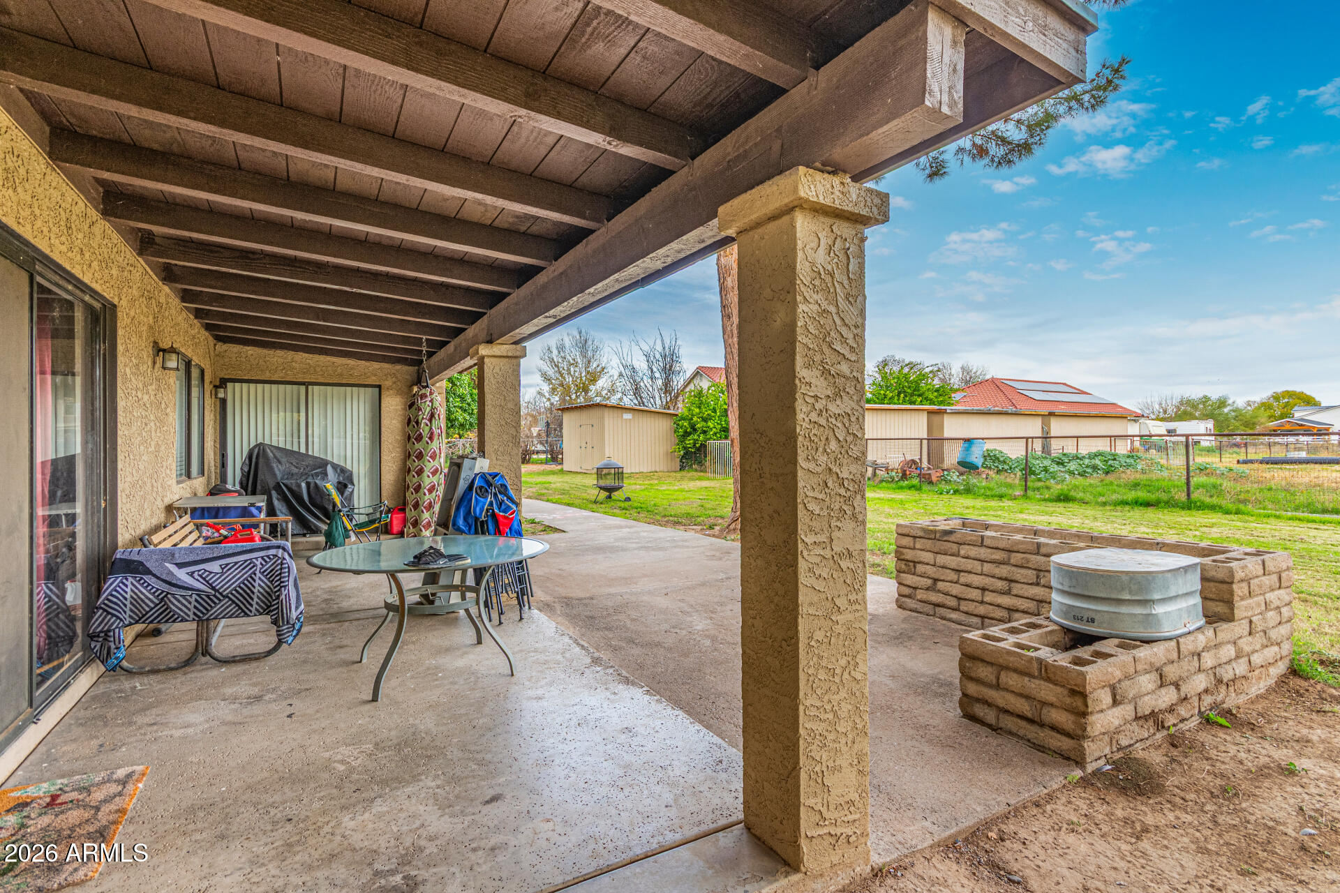 21613 South 154th Street Gilbert, AZ 85298 - Photo 50 of 57 a building outdoor space with patio furniture and garden