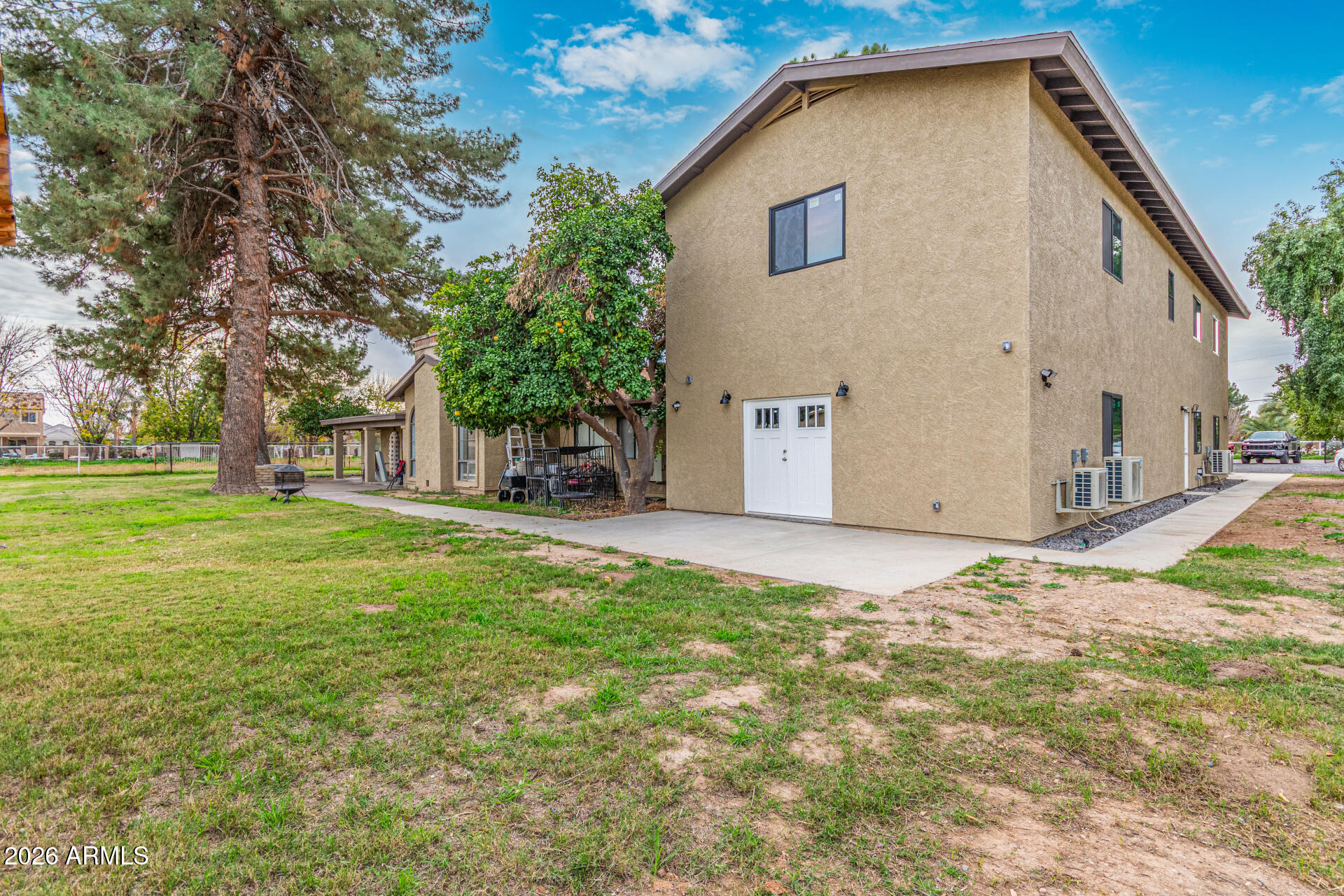21613 South 154th Street Gilbert, AZ 85298 - Photo 52 of 57 a view of a house with a yard